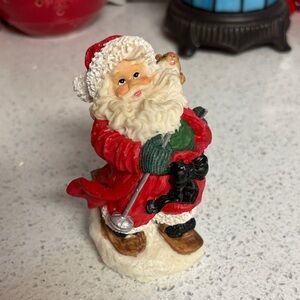 Festive skiing Santa Claus Figurine in Red and Green